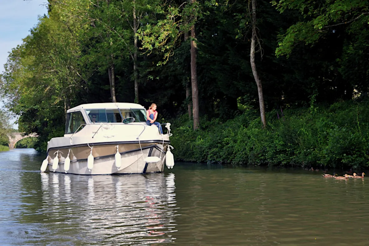 Exterior view of Cantate, a Nicols Sedan Primo motorboat at Grez-Neuville, France