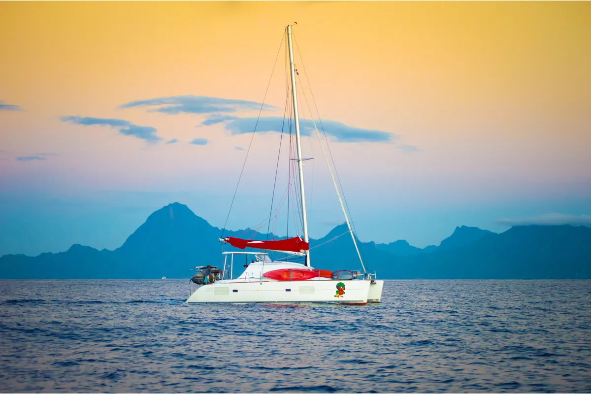 Exterior view of Poe Vai, a Lagoon 380 S2 catamaran at Papeete, France