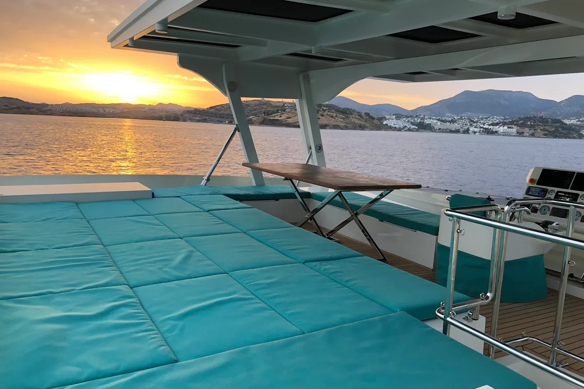 Deck of Premium +, a Gulet Serenity 64 catamaran at Sant Antoni de Portmany, Spain