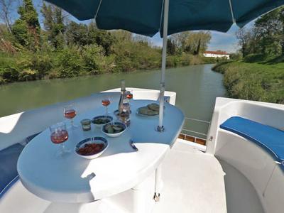 Deck of Royal Mystique A - Comfort Plus 21, a Cygnet Royal Mystique motorboat at Branges, France