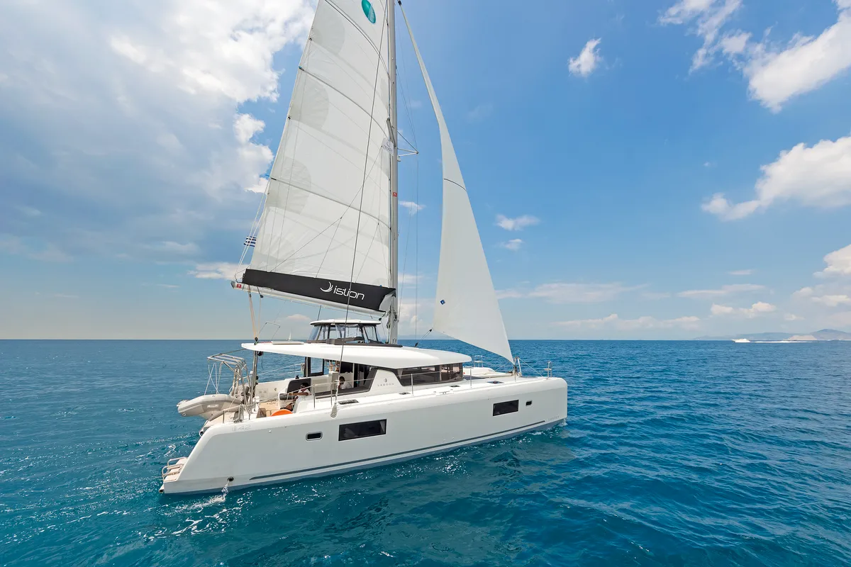 Exterior view of Deja Vu, a Lagoon 42 catamaran at Lavreotiki Municipal Unit, Greece
