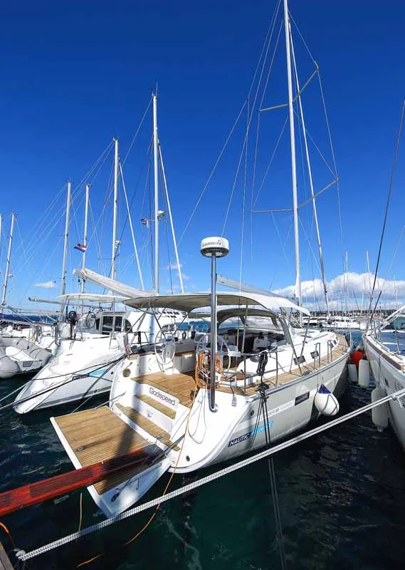 Exterior view of Godspeed, a Bavaria Cruiser 50 Avantgarde sailboat at Murter, Croatia