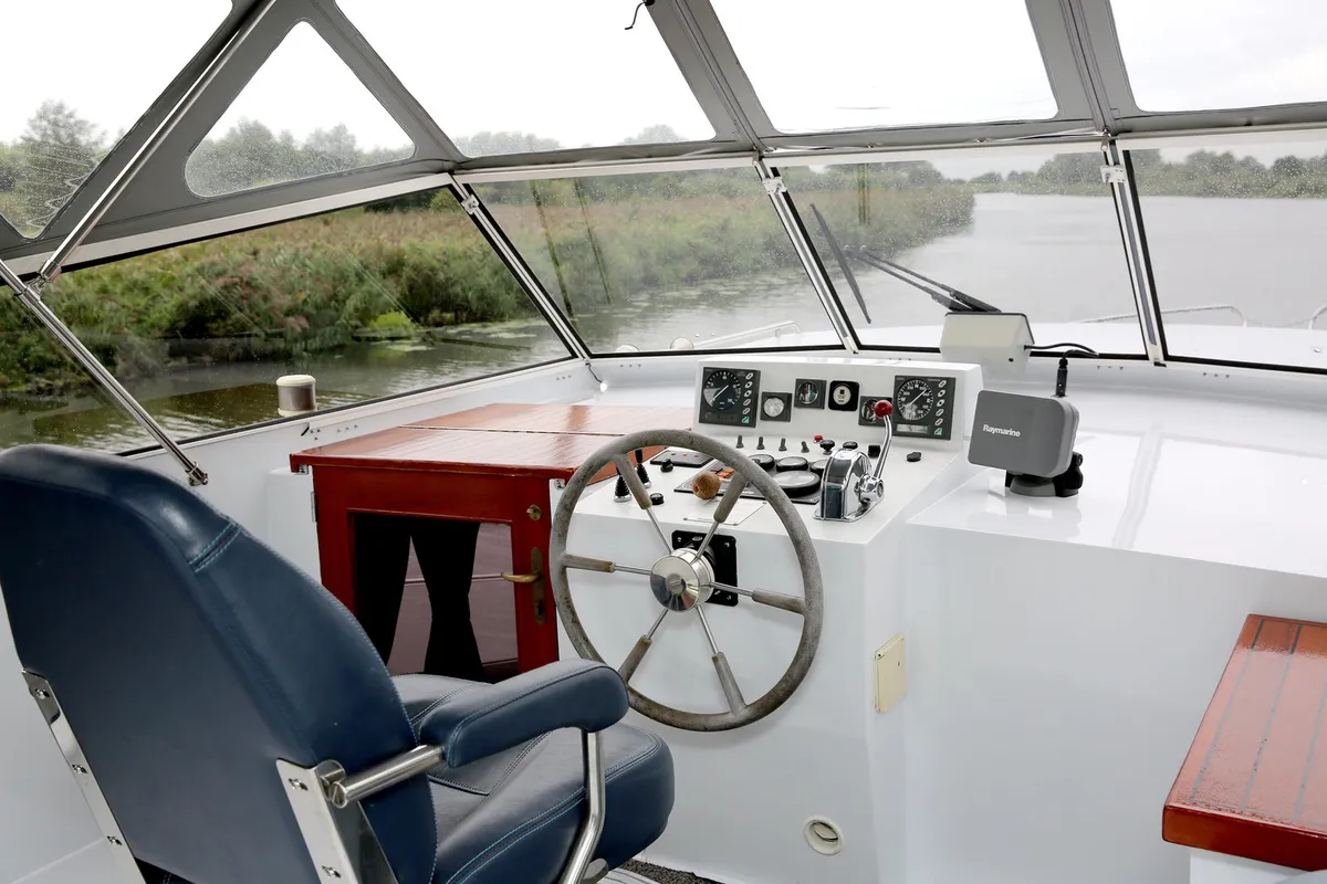 Cockpit of Majoris, a De Drait Renal 40 motorboat at Heukelum, Netherlands