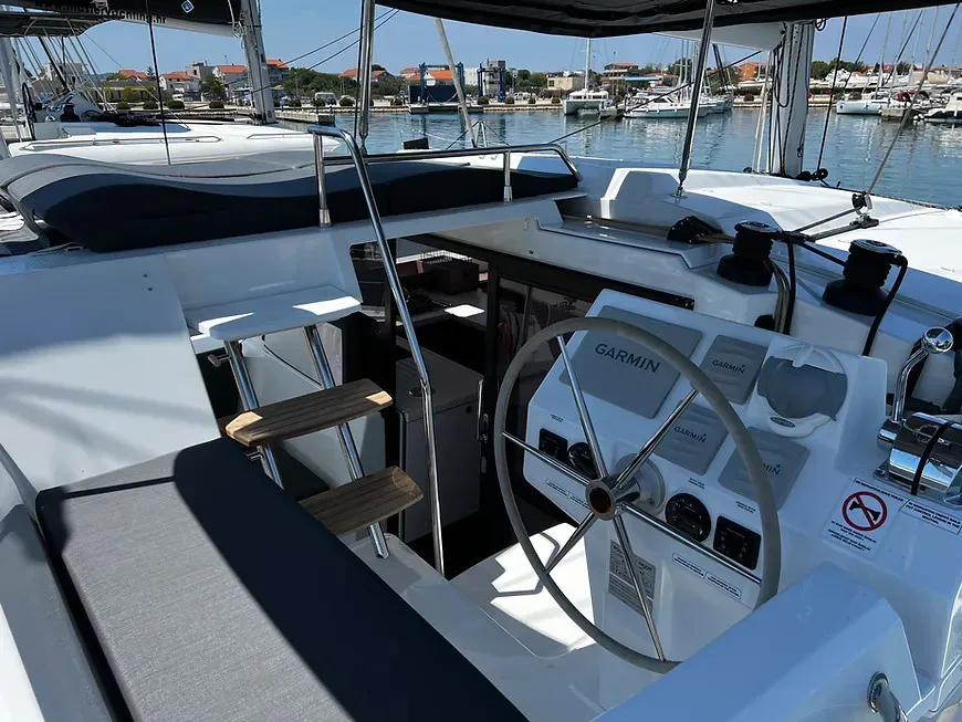 Cockpit of Jami, a Fountaine Pajot Astréa 42 catamaran at Pula, Croatia