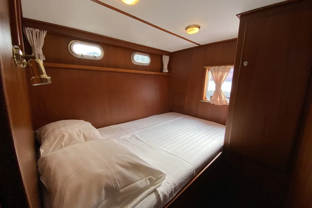 Cabin on Atlas, a Tyvano 1400 motorboat at Heukelum, Netherlands