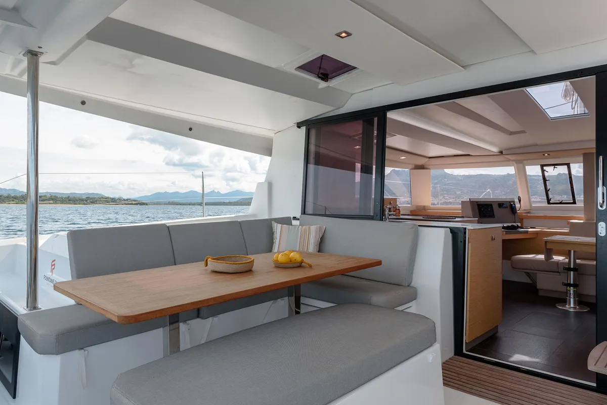 Deck of Agitation - A/C, Generator, Water maker. Solar panel, a Fountaine Pajot Astréa 42 catamaran at Cannigione, Italy