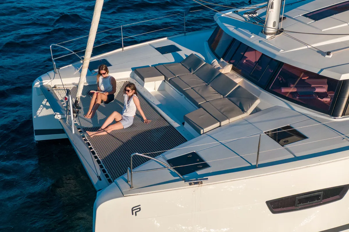 Deck of Agitation - A/C, Generator, Water maker. Solar panel, a Fountaine Pajot Astréa 42 catamaran at Cannigione, Italy