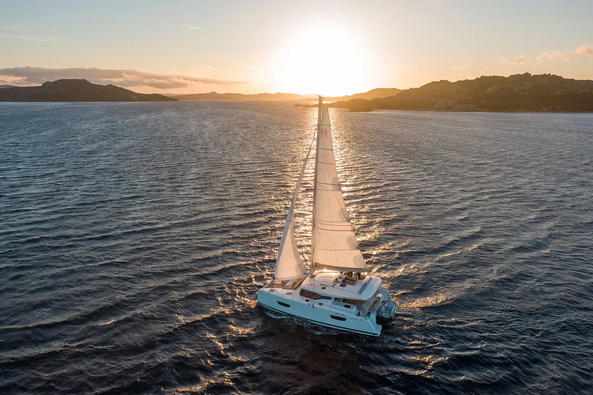 Exterior view of Agitation - A/C, Generator, Water maker. Solar panel, a Fountaine Pajot Astréa 42 catamaran at Cannigione,…