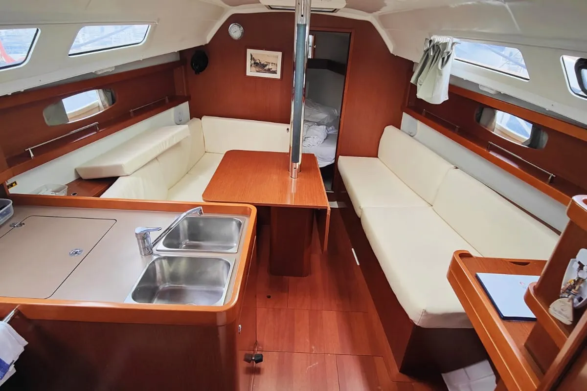 Salon of Titina, a Beneteau Oceanis 31 sailboat at Procida, Italy