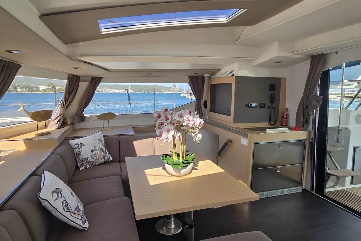 Salon of Ruinart, a Fountaine Pajot Elba 45 catamaran at Olbia, Italy