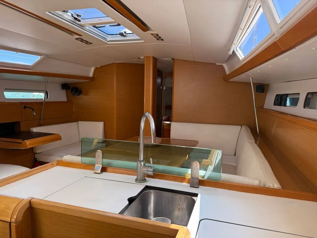 Galley of Mientras Tanto, a Jeanneau Sun Odyssey 449 sailboat at Ibiza, Spain