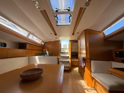 Salon of Mientras Tanto, a Jeanneau Sun Odyssey 449 sailboat at Ibiza, Spain