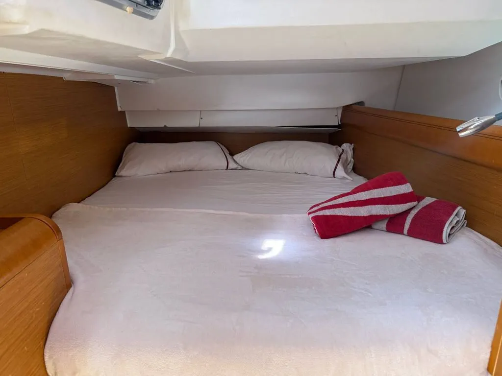 Cabin on Mientras Tanto, a Jeanneau Sun Odyssey 449 sailboat at Ibiza, Spain