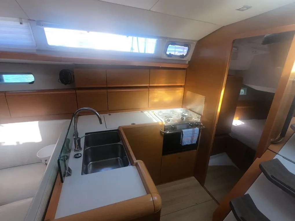 Galley of Mientras Tanto, a Jeanneau Sun Odyssey 449 sailboat at Ibiza, Spain