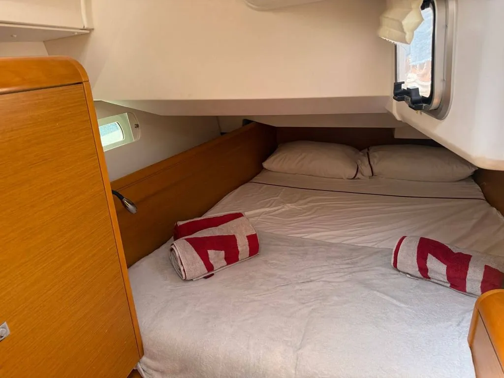 Cabin on Mientras Tanto, a Jeanneau Sun Odyssey 449 sailboat at Ibiza, Spain