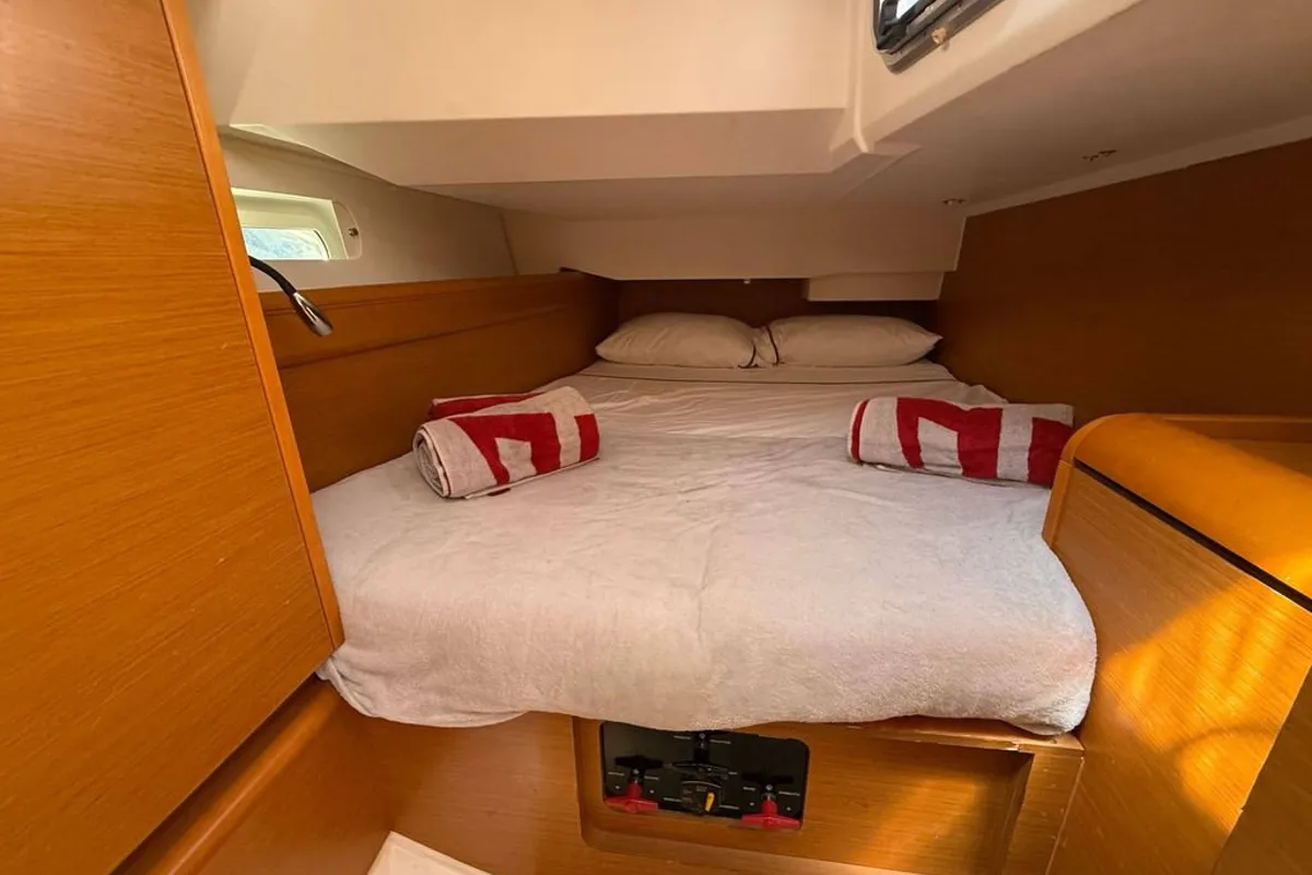 Cabin on Mientras Tanto, a Jeanneau Sun Odyssey 449 sailboat at Ibiza, Spain