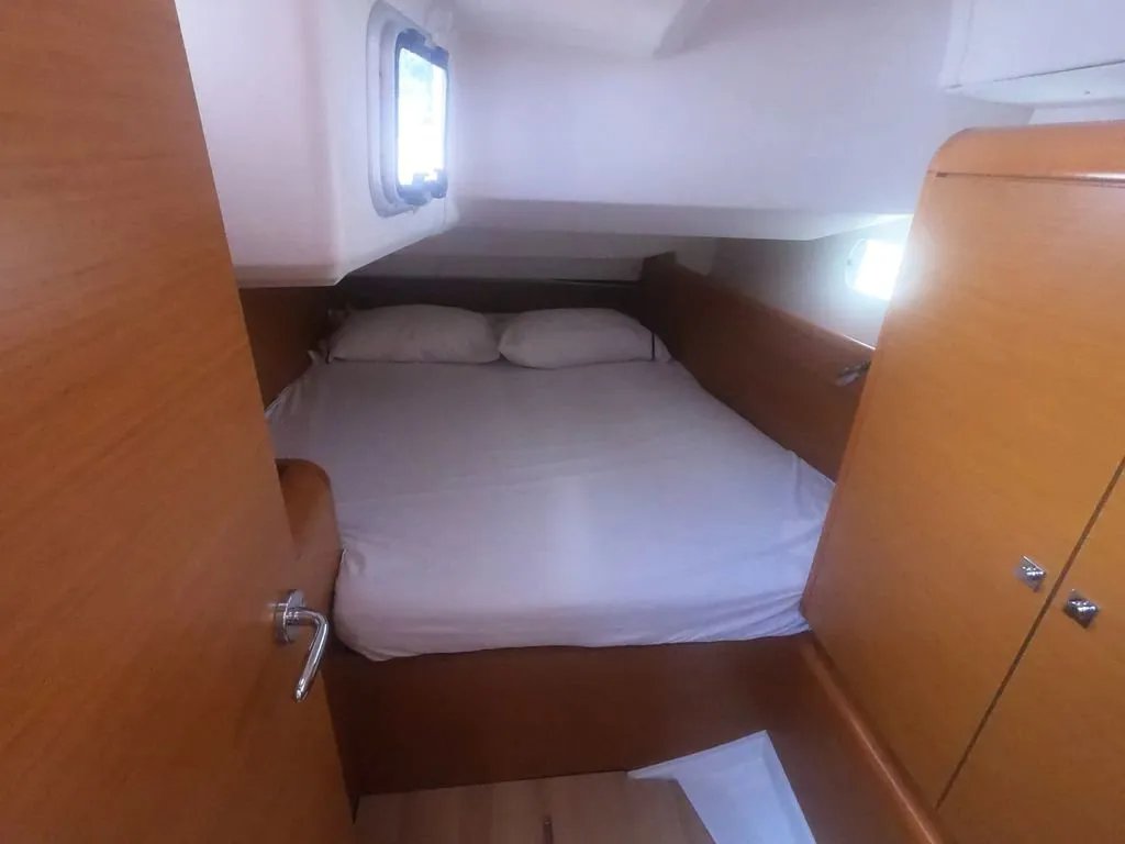 Cabin on Mientras Tanto, a Jeanneau Sun Odyssey 449 sailboat at Ibiza, Spain