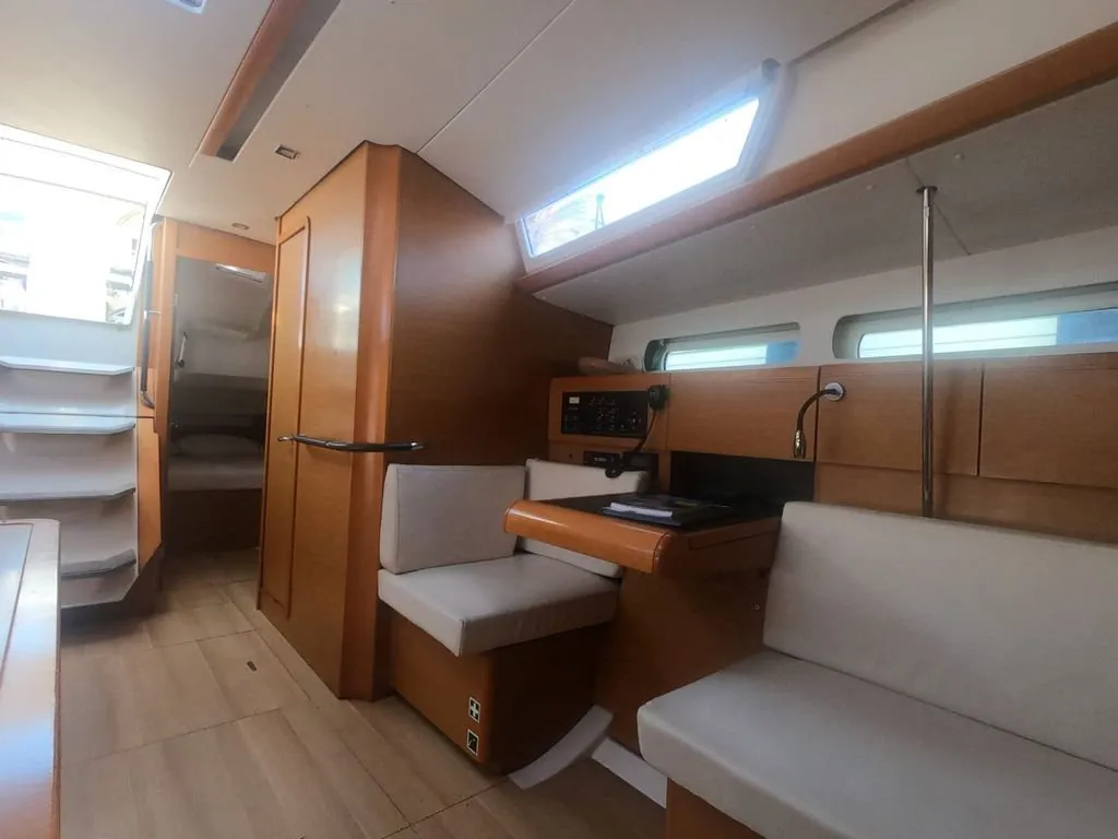 Salon of Mientras Tanto, a Jeanneau Sun Odyssey 449 sailboat at Ibiza, Spain