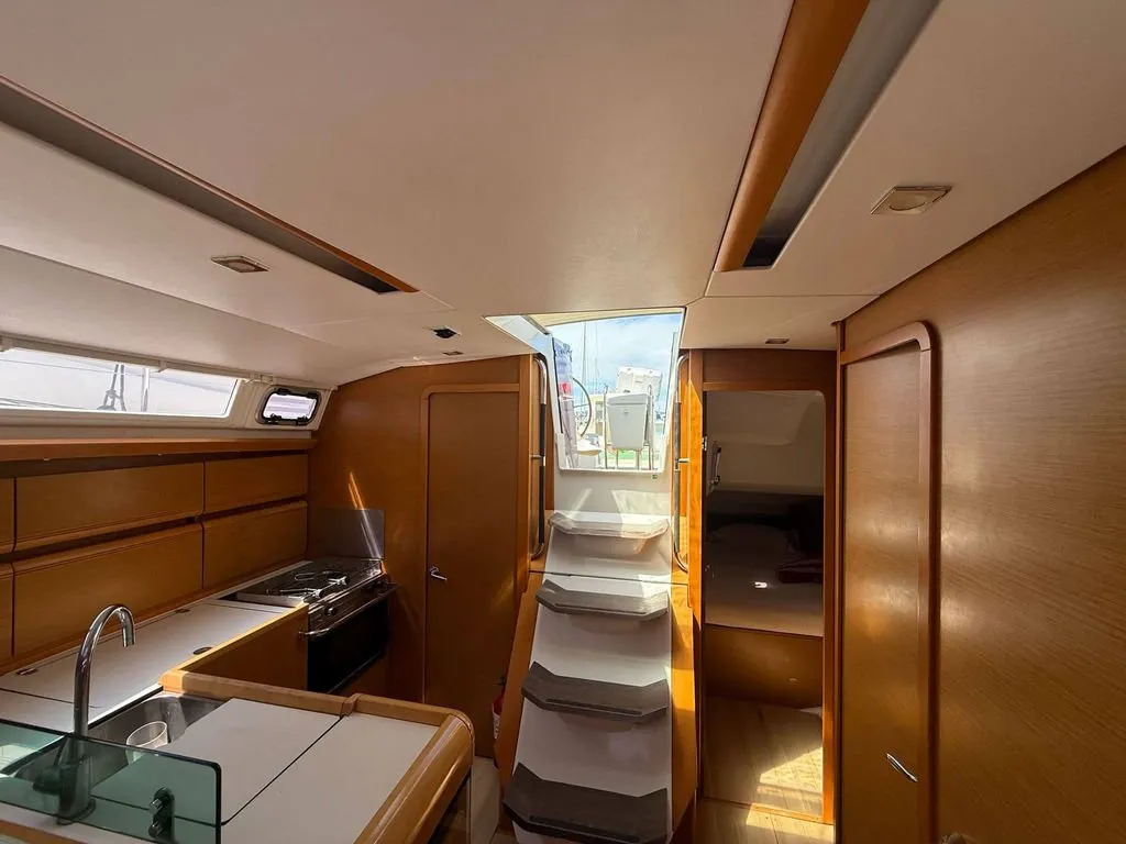 Cabin on Mientras Tanto, a Jeanneau Sun Odyssey 449 sailboat at Ibiza, Spain