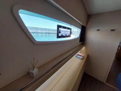 Salon of Ancora Reha, a Fountaine Pajot Saona 47 catamaran at Rosignano Solvay, Italy