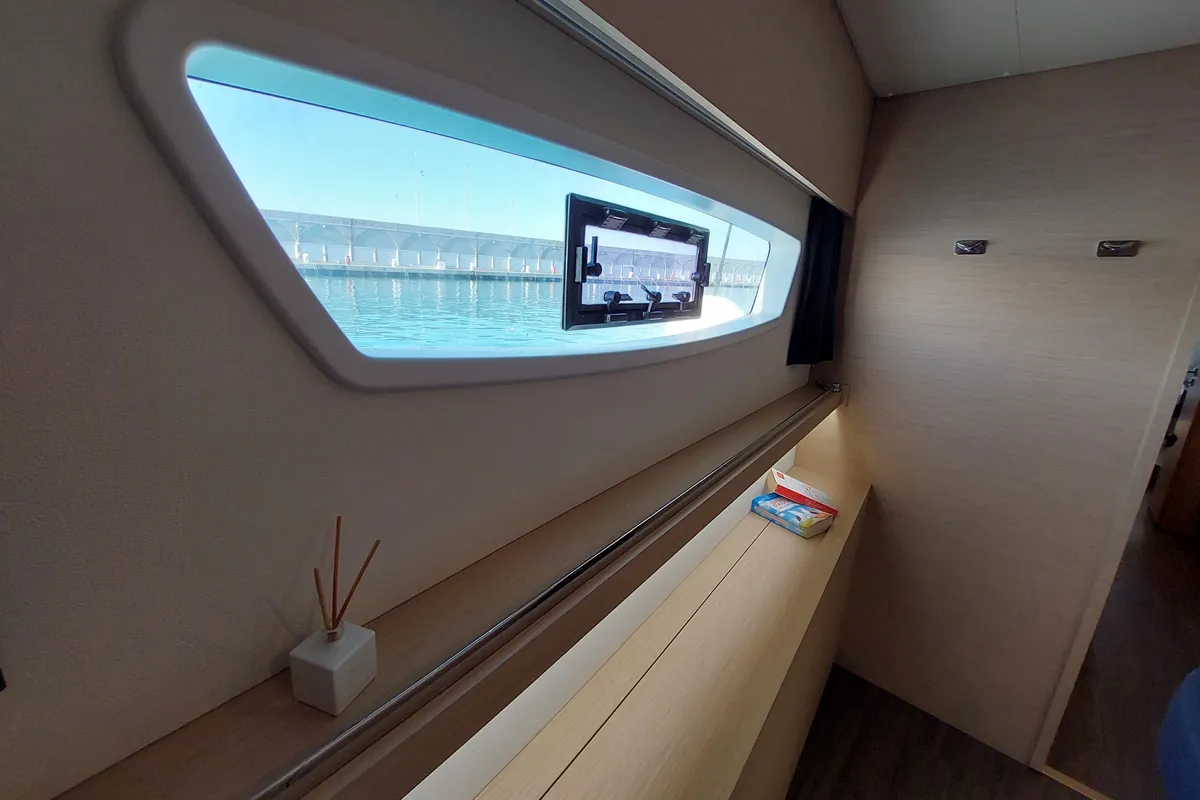 Salon of Ancora Reha, a Fountaine Pajot Saona 47 catamaran at Rosignano Solvay, Italy