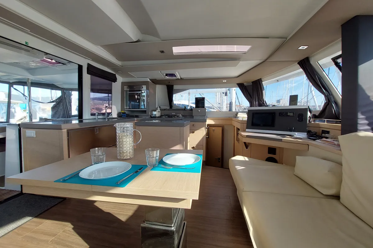 Salon of Ancora Reha, a Fountaine Pajot Saona 47 catamaran at Rosignano Solvay, Italy