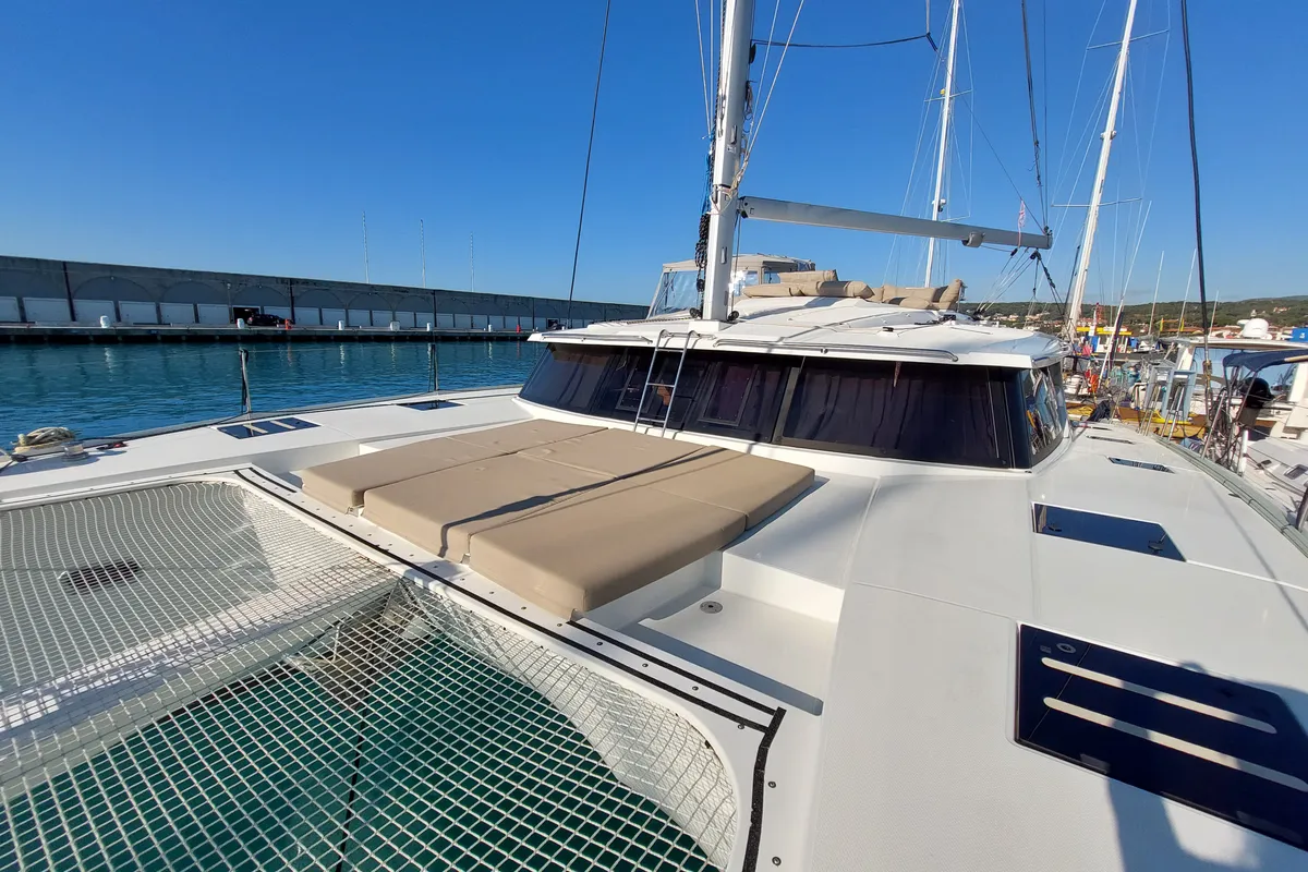 Exterior view of Ancora Reha, a Fountaine Pajot Saona 47 catamaran at Rosignano Solvay, Italy