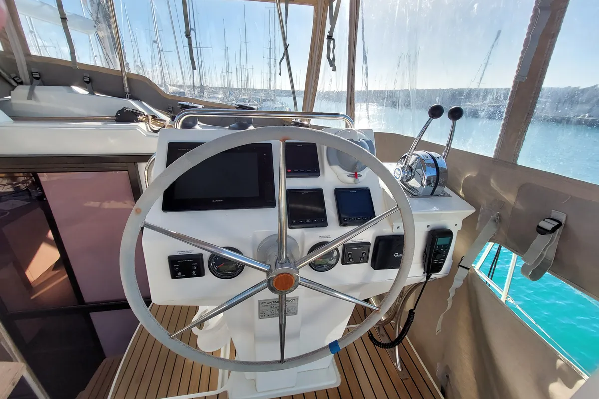 Cockpit of Ancora Reha, a Fountaine Pajot Saona 47 catamaran at Rosignano Solvay, Italy