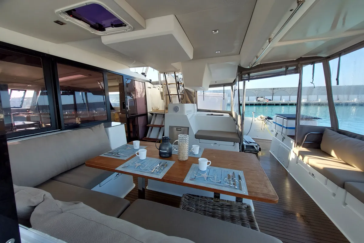 Deck of Ancora Reha, a Fountaine Pajot Saona 47 catamaran at Rosignano Solvay, Italy