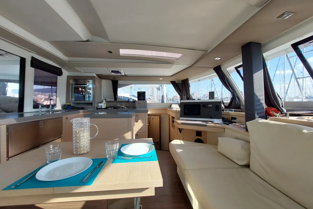Salon of Ancora Reha, a Fountaine Pajot Saona 47 catamaran at Rosignano Solvay, Italy