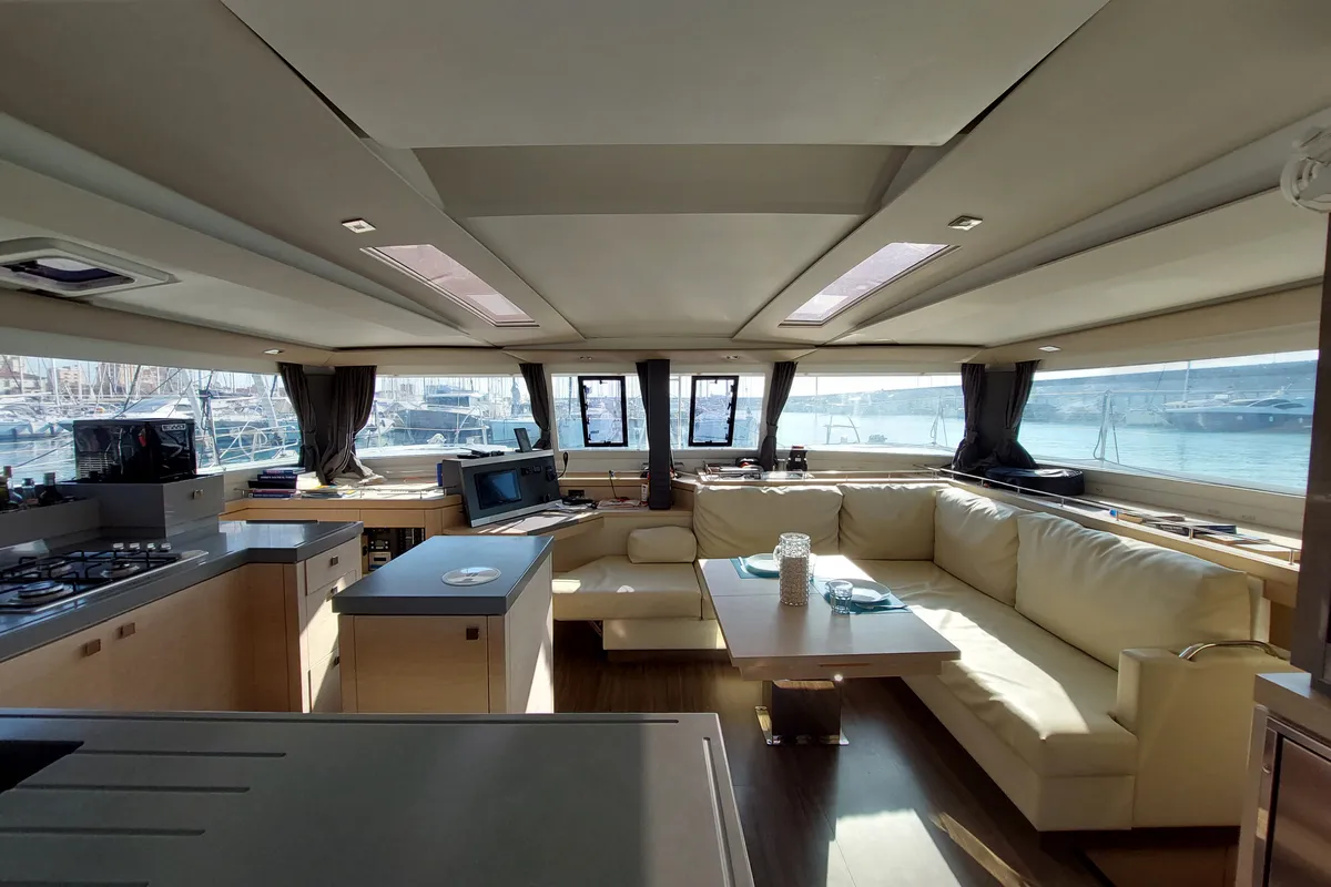 Salon of Ancora Reha, a Fountaine Pajot Saona 47 catamaran at Rosignano Solvay, Italy