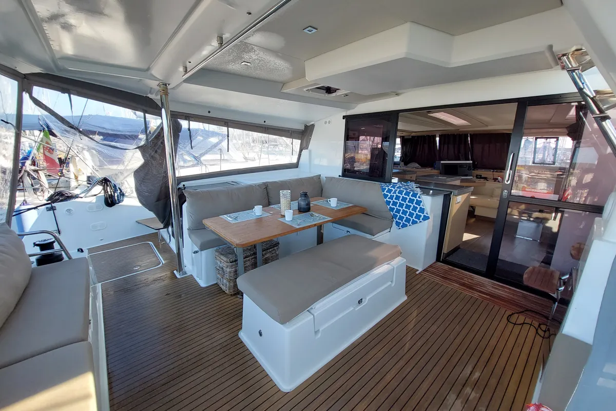 Deck of Ancora Reha, a Fountaine Pajot Saona 47 catamaran at Rosignano Solvay, Italy