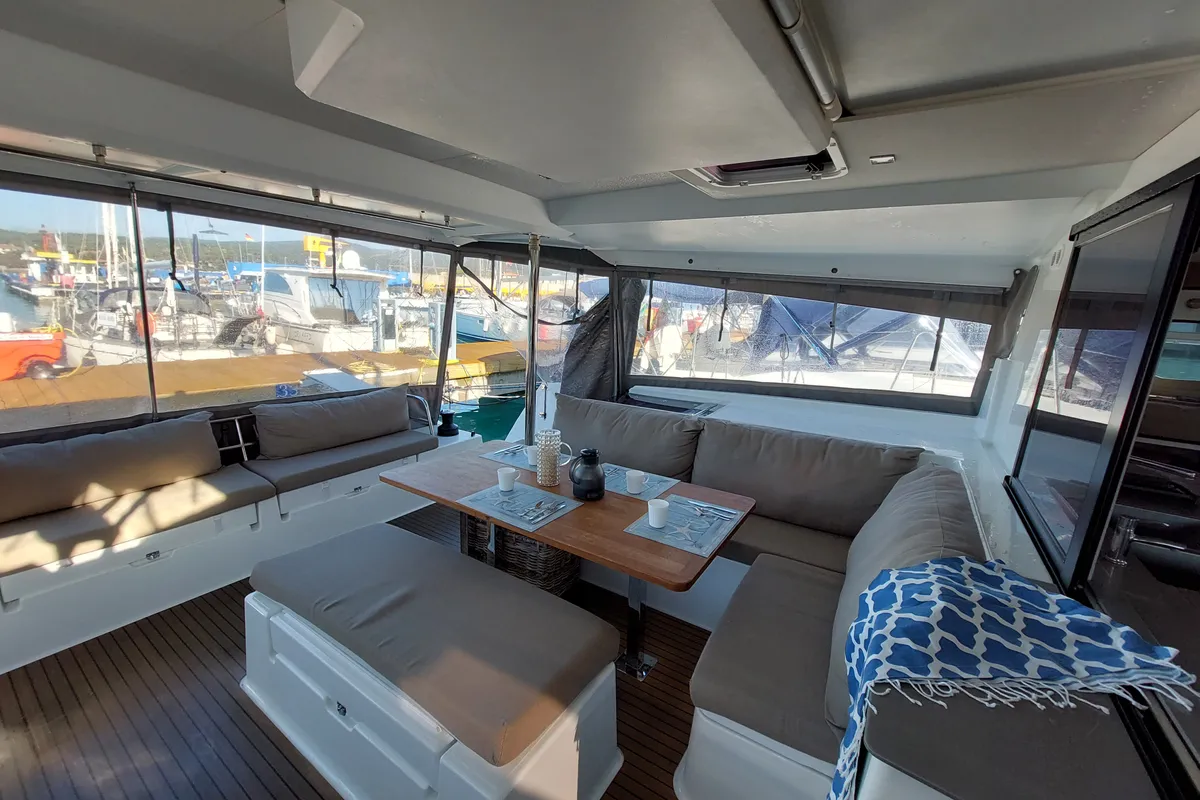 Deck of Ancora Reha, a Fountaine Pajot Saona 47 catamaran at Rosignano Solvay, Italy