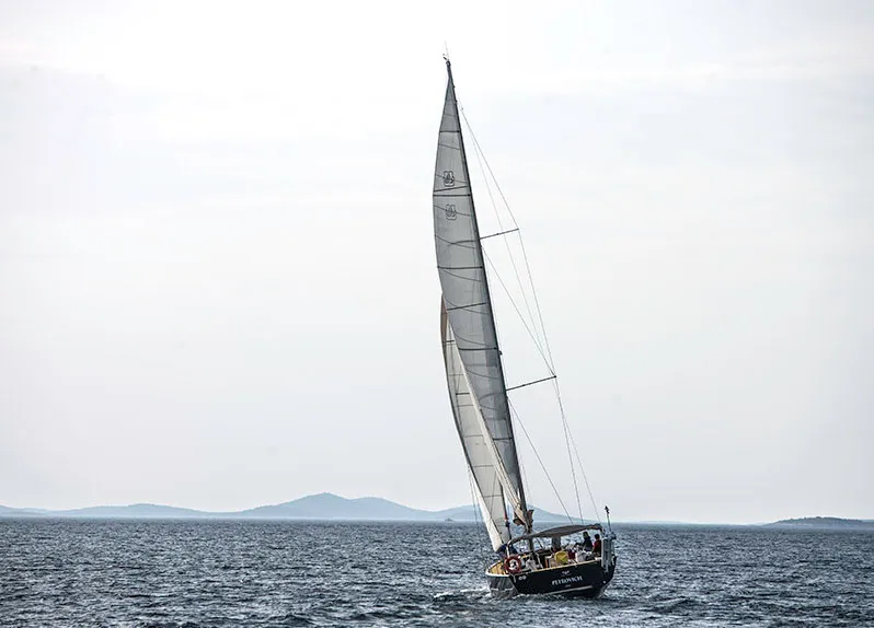 Exterior view of Kazka, a Dufour Exclusive 56 sailboat at Primošten, Croatia