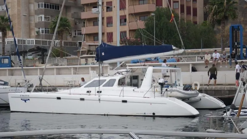 Exterior view of Alboran Ron Punch (Majorca), a Voyage 440 catamaran at es Jonquet, Spain