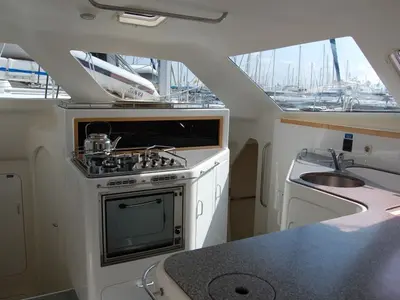 Galley of Alboran Ron Punch (Majorca), a Voyage 440 catamaran at es Jonquet, Spain