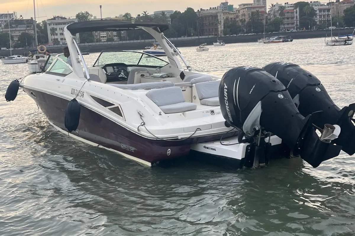 Exterior view of Godiva, a Sea Ray SLX 300 motorboat at Mumbai Harbour, India