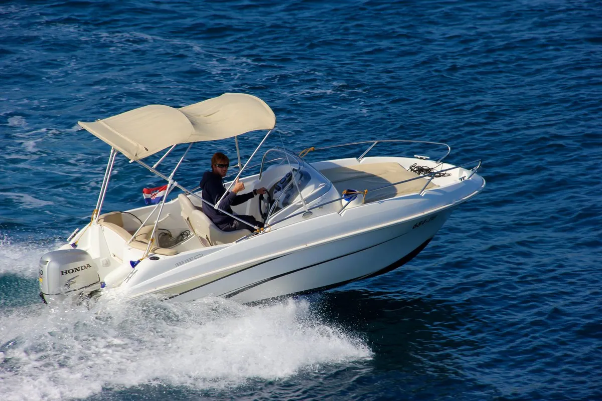 Exterior view of Benetau Flyer 550 Sun Deck, a Beneteau 550 Flyer motorboat at Grad Trogir, Croatia