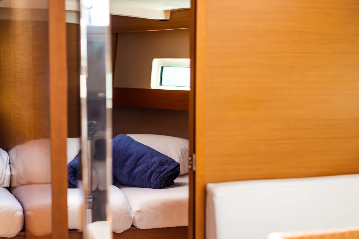 Cabin on Malala, a Jeanneau Sun Odyssey 440 sailboat at Olbia, Italy