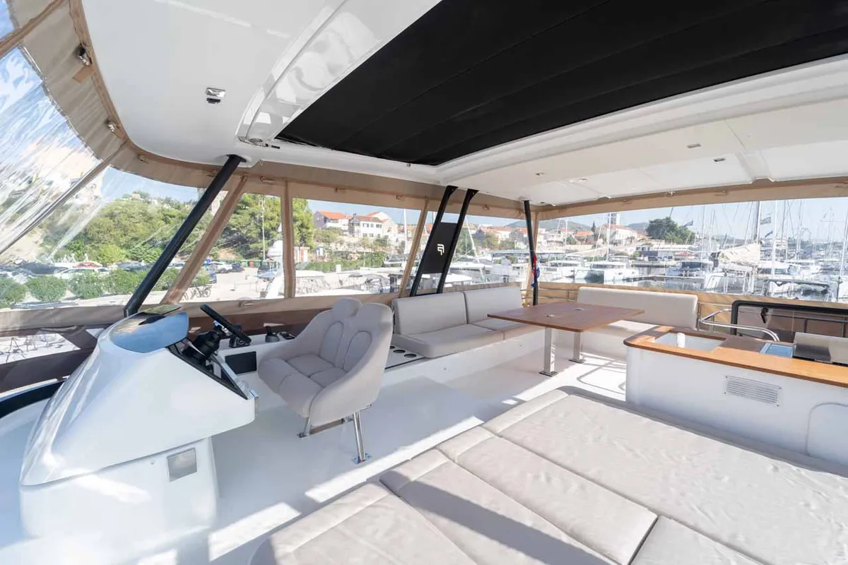 Cockpit of Family 2.0, a Fountaine Pajot MY6 catamaran at Grad Šibenik, Croatia