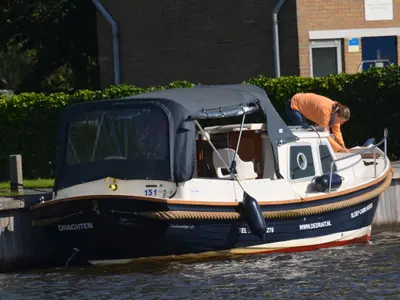 Exterior view of Drait 154, a De Drait Drachtster Sloep Cabin 750 motorboat at Drachten, Netherlands