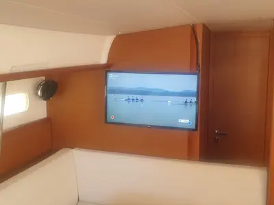 Salon of In A Silent Way, a Jeanneau Sun Odyssey 519 sailboat at Tropea, Italy