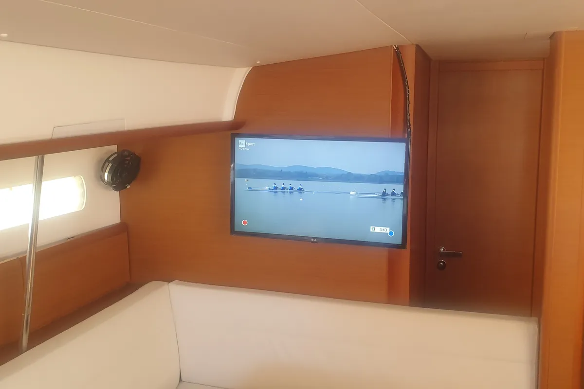 Salon of In A Silent Way, a Jeanneau Sun Odyssey 519 sailboat at Tropea, Italy