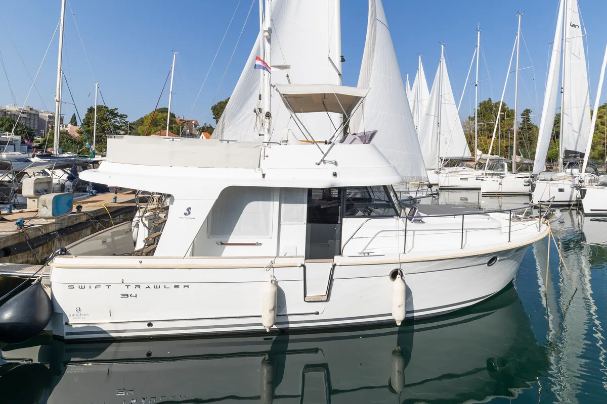 Exterior view of Blue Sky, a Beneteau Swift Trawler 34 Fly motorboat at Zadar, Croatia