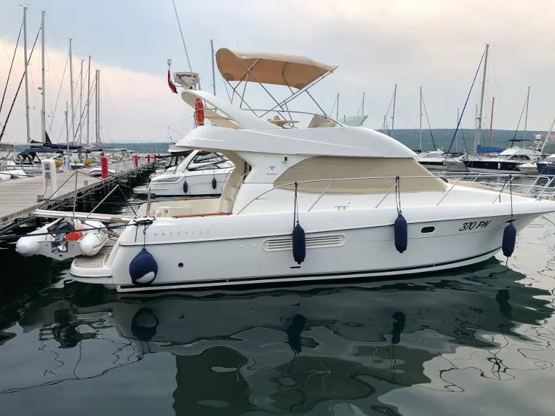 Exterior view of Fortuna, a Jeanneau Prestige 36 Fly motorboat at Punat, Croatia