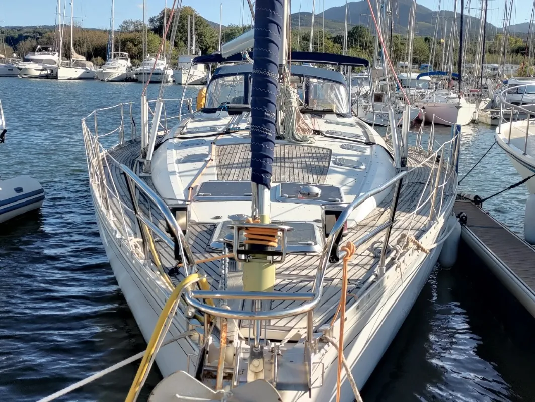 Exterior view of Slow, a Jeanneau Sun Odyssey 52.2 sailboat at Castelló d'Empúries, Spain