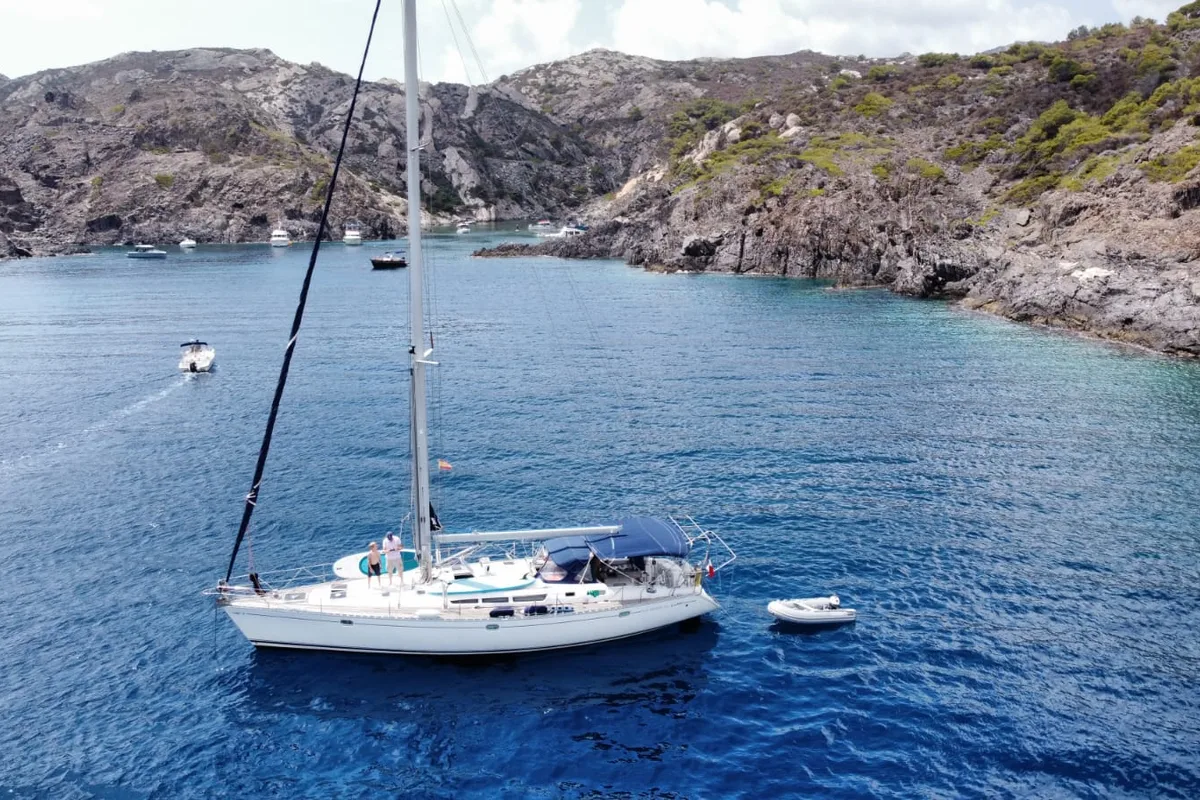 Exterior view of Slow, a Jeanneau Sun Odyssey 52.2 sailboat at Castelló d'Empúries, Spain