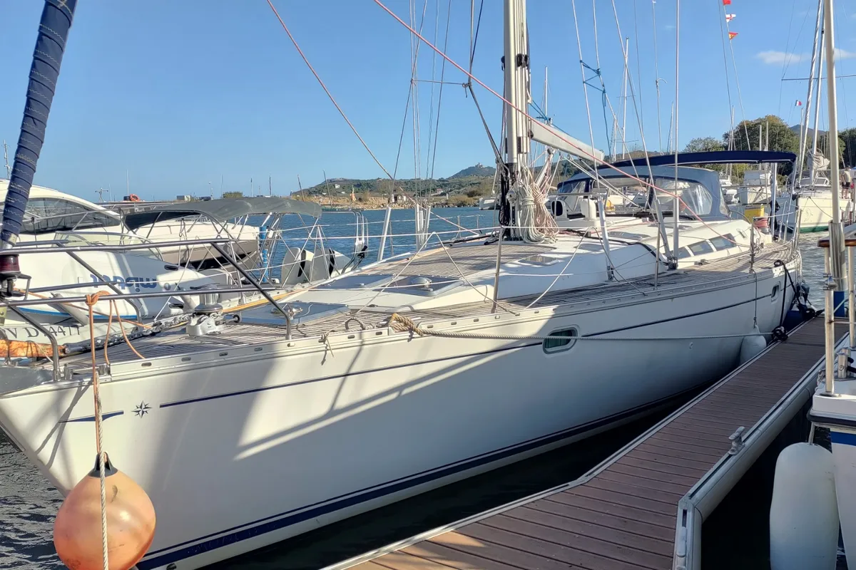 Exterior view of Slow, a Jeanneau Sun Odyssey 52.2 sailboat at Castelló d'Empúries, Spain