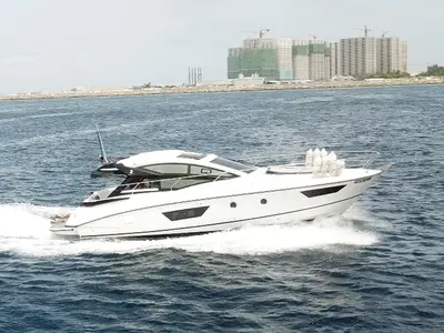 Exterior view of Island Cruise, a Beneteau GT40 motorboat at Malé, Maldives