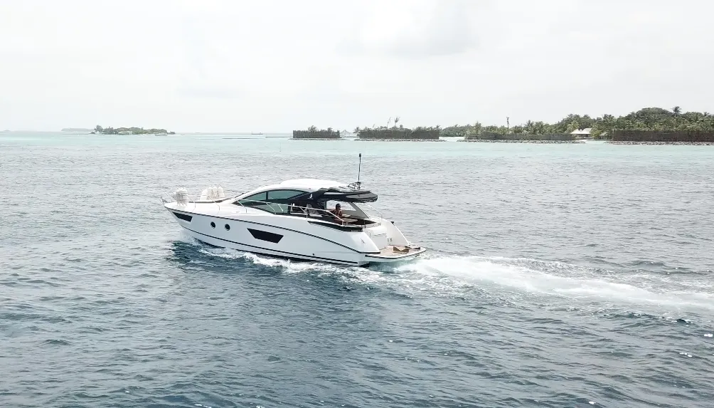Exterior view of Island Cruise, a Beneteau GT40 motorboat at Malé, Maldives